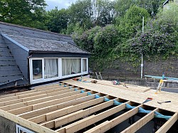 Flat roof timber work traditional herringbone strutting